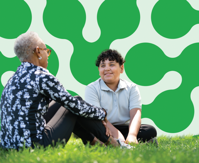 Participant speaking with a mentor.